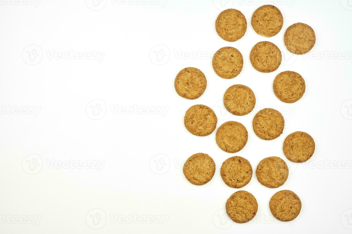 Sweet cookies on white photo