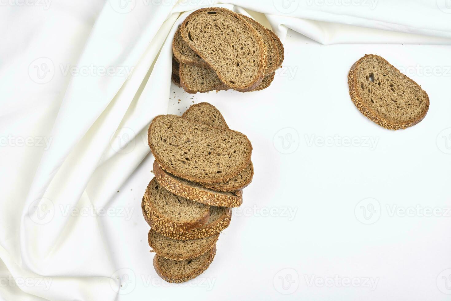 Pile of loaf bread slices photo