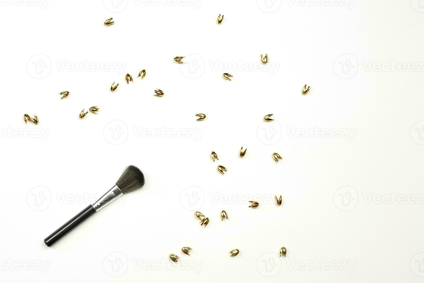 Make-up brush and trinkets photo
