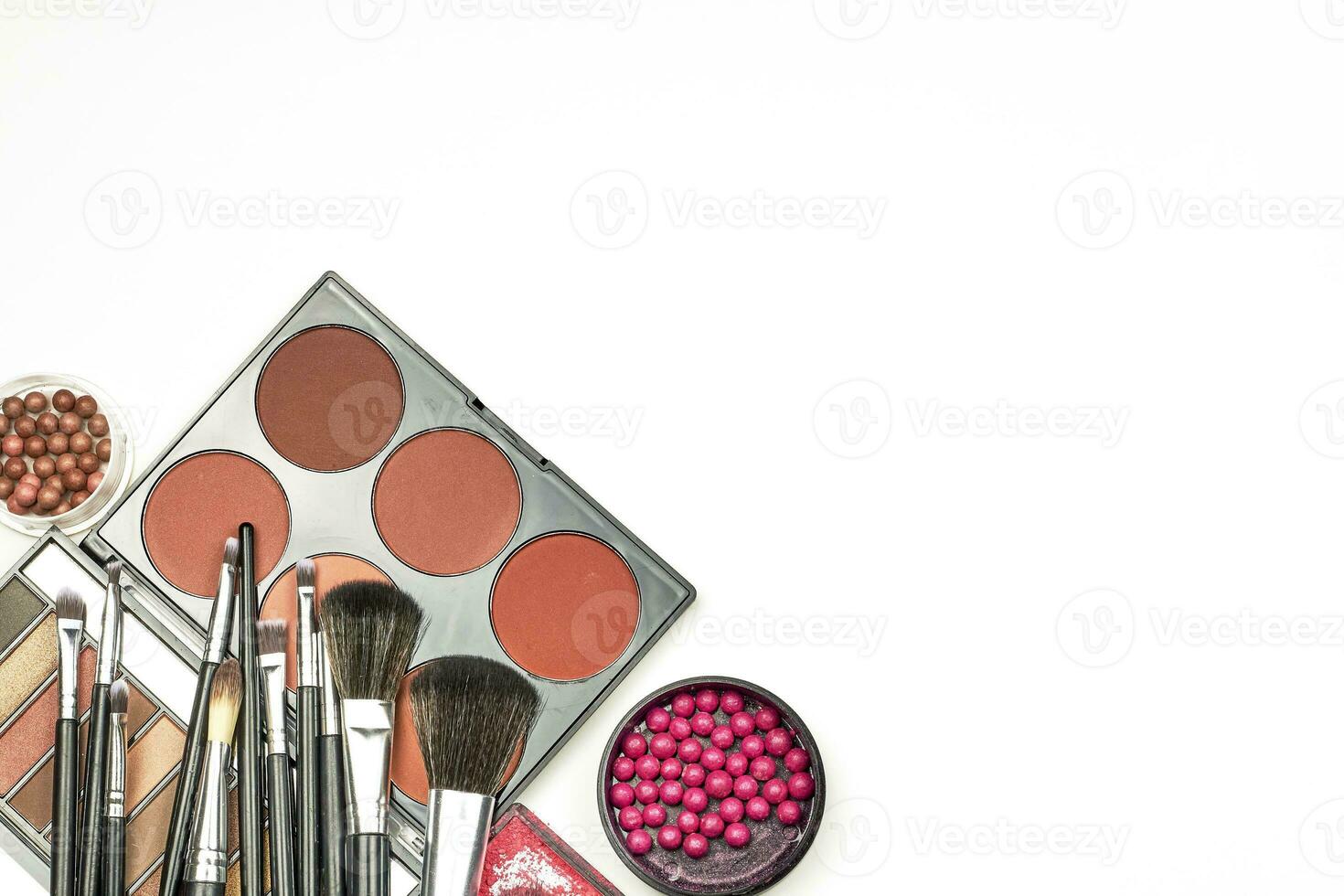 Feminine beauty kit on white photo