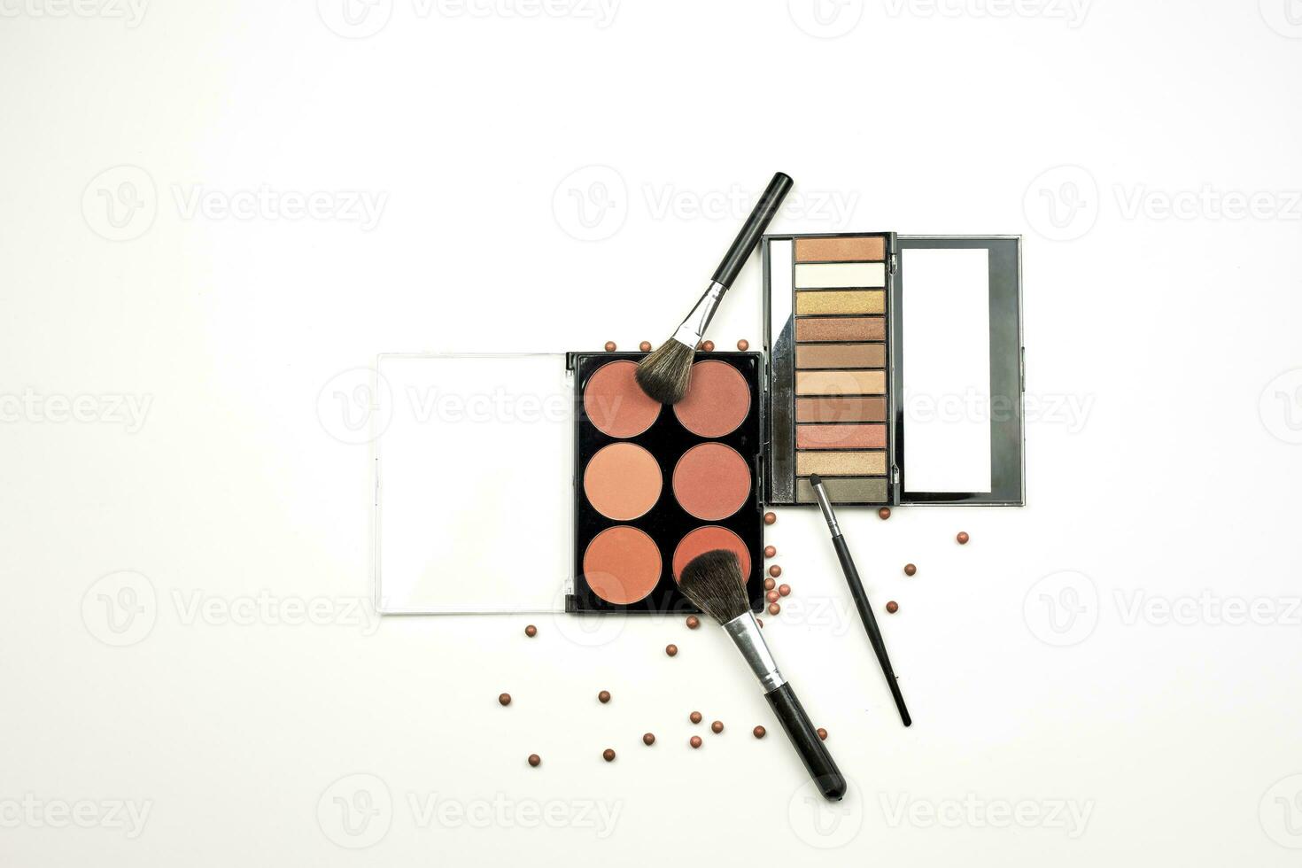 Feminine beauty kit on white photo