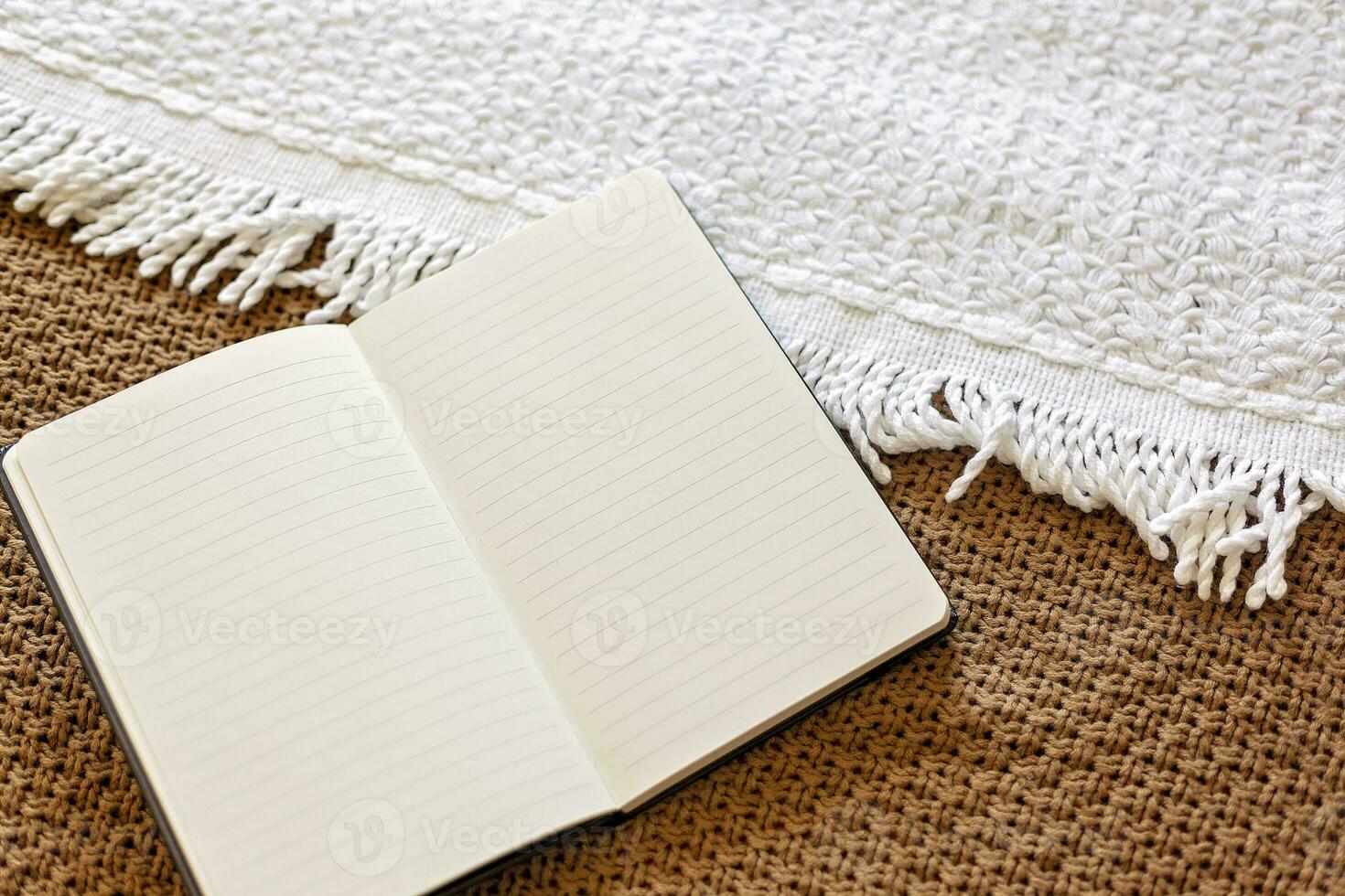My love diary - The daily journal. Personal diary on knitted woolen textile. Keeping a Diary or Journal recording everyday thoughts photo