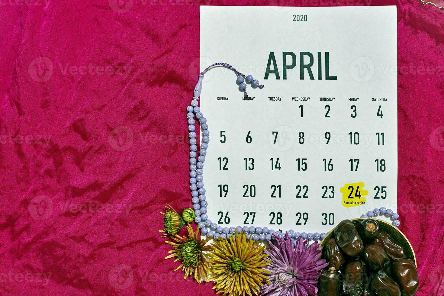 April monthly calendar on red photo