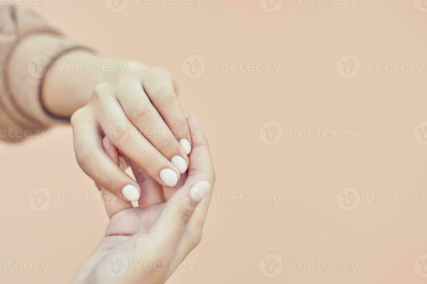 Woman hands showing beautiful manicure photo