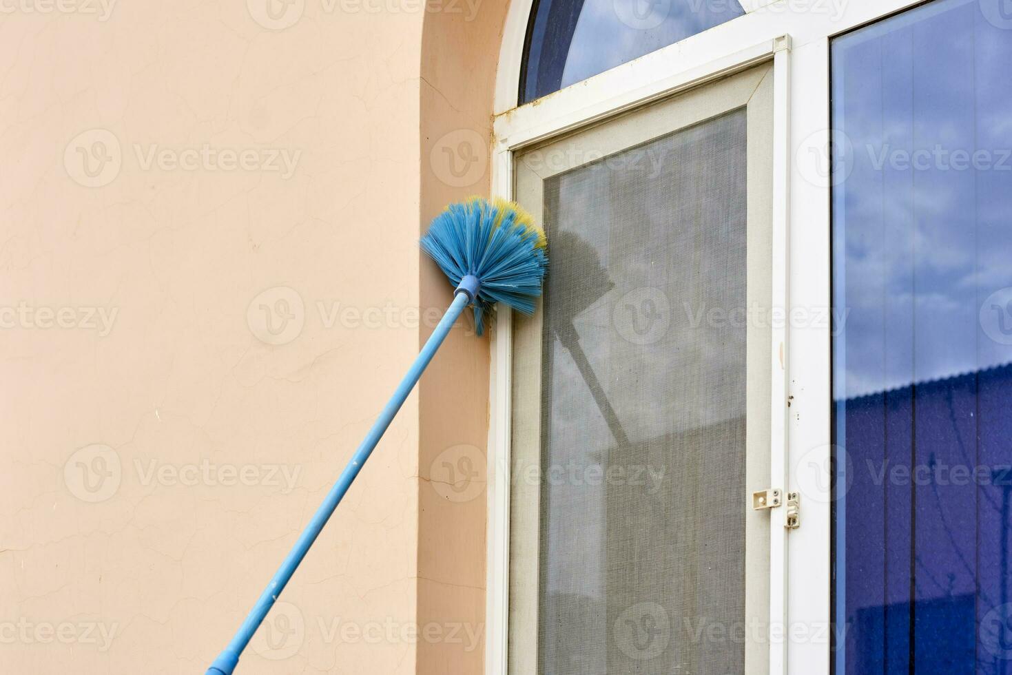 Cleaning window dust photo