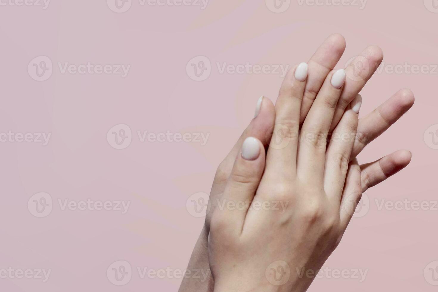 Woman hands showing beautiful manicure photo