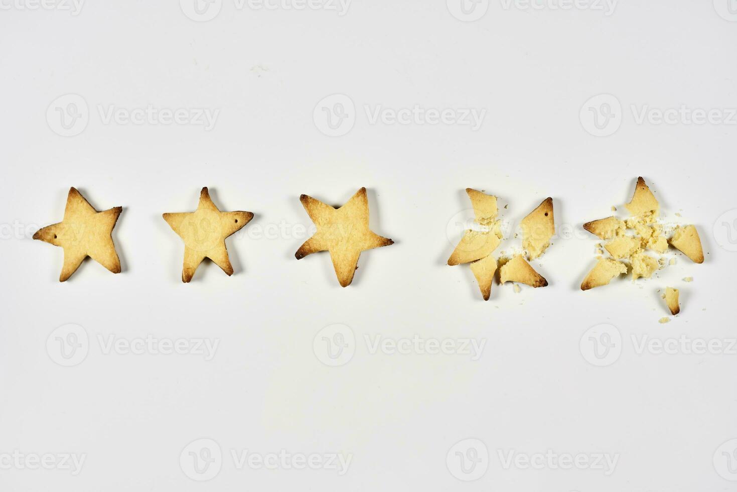 Three stars ranking. 3 baked star shape cookies photo