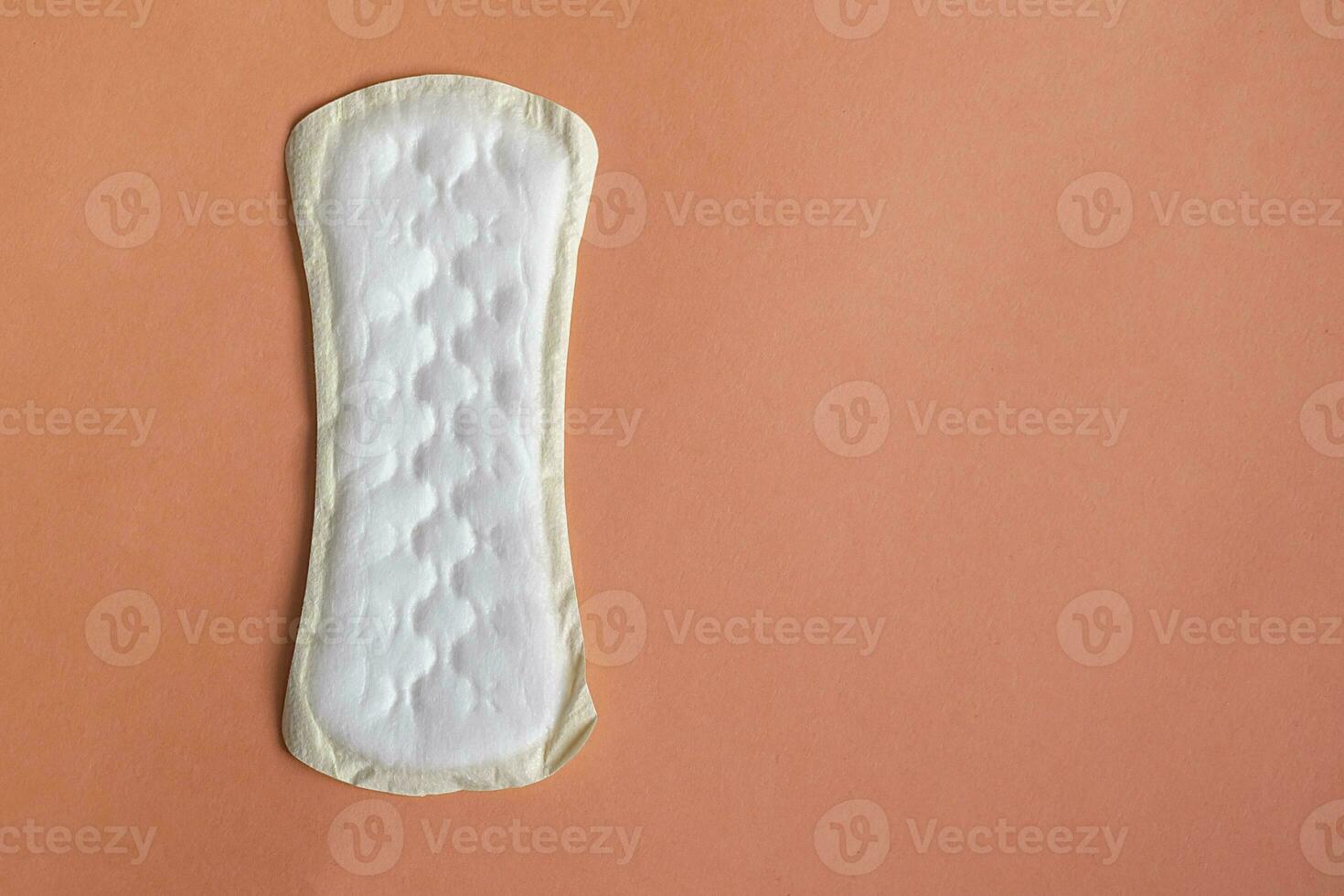 Sanitary napkins or menstrual pad on Pantone colored background. Copy space. photo