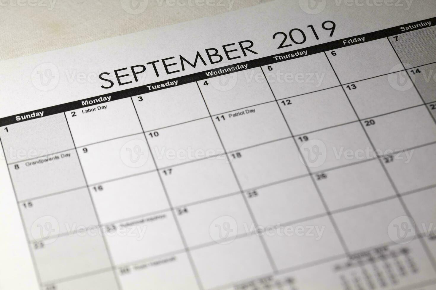 Labor day in selective focus on the simple September 2019 calendar. photo