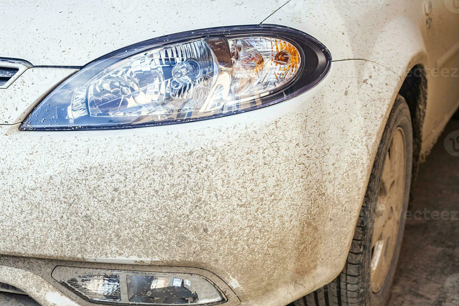 A dirty car after rain photo