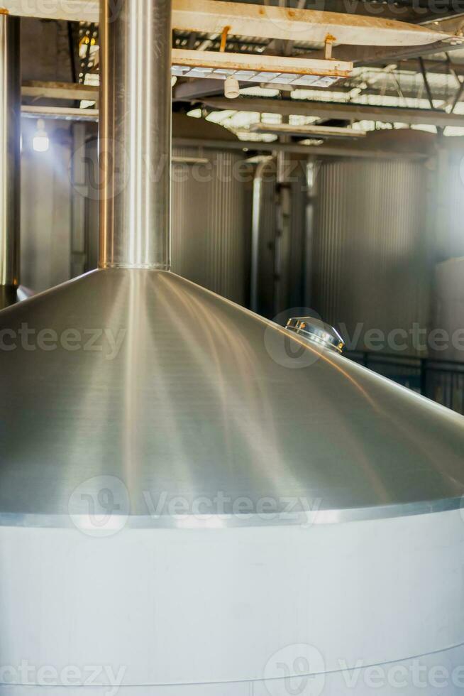 brewery stainless steel tanks. business concept brewed beer, beer production photo