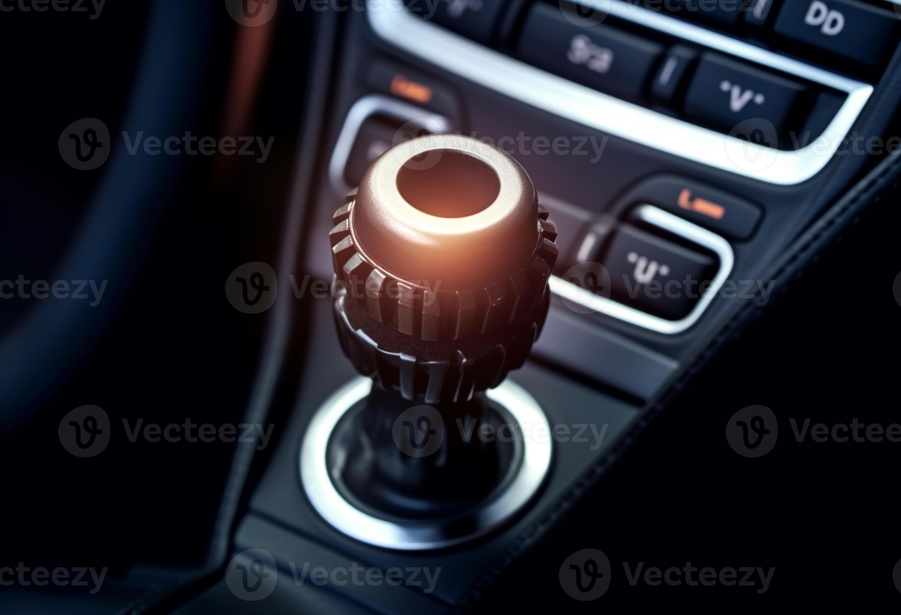 Closeup on automatic transmission lever in modern car multimedia and