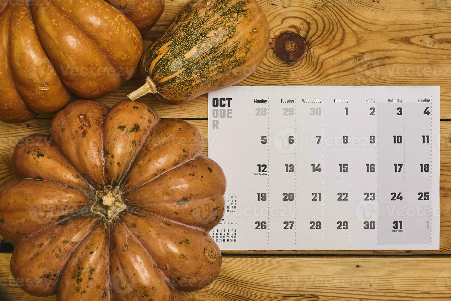 October 2020 monthly calendar with Pumpkin on wood photo