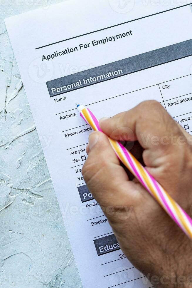 Filling employment application form photo