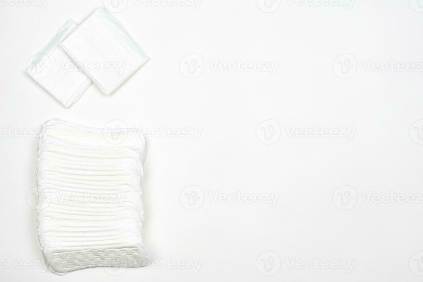 White feminine pads on white photo