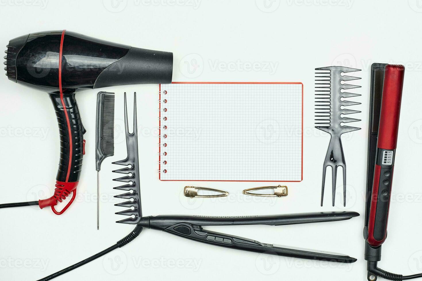 Working table of hairdresser with accessories and notepad photo