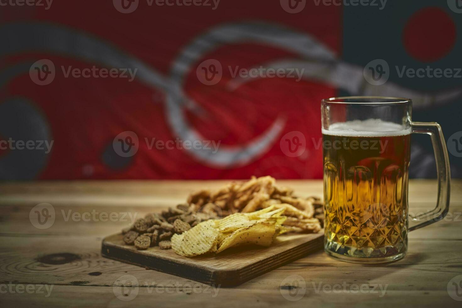 Beer glass and snacks photo