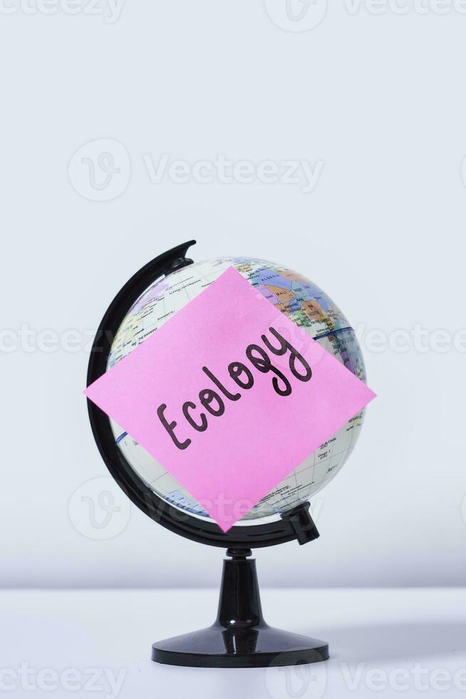 Earth globe with note - Ecology photo