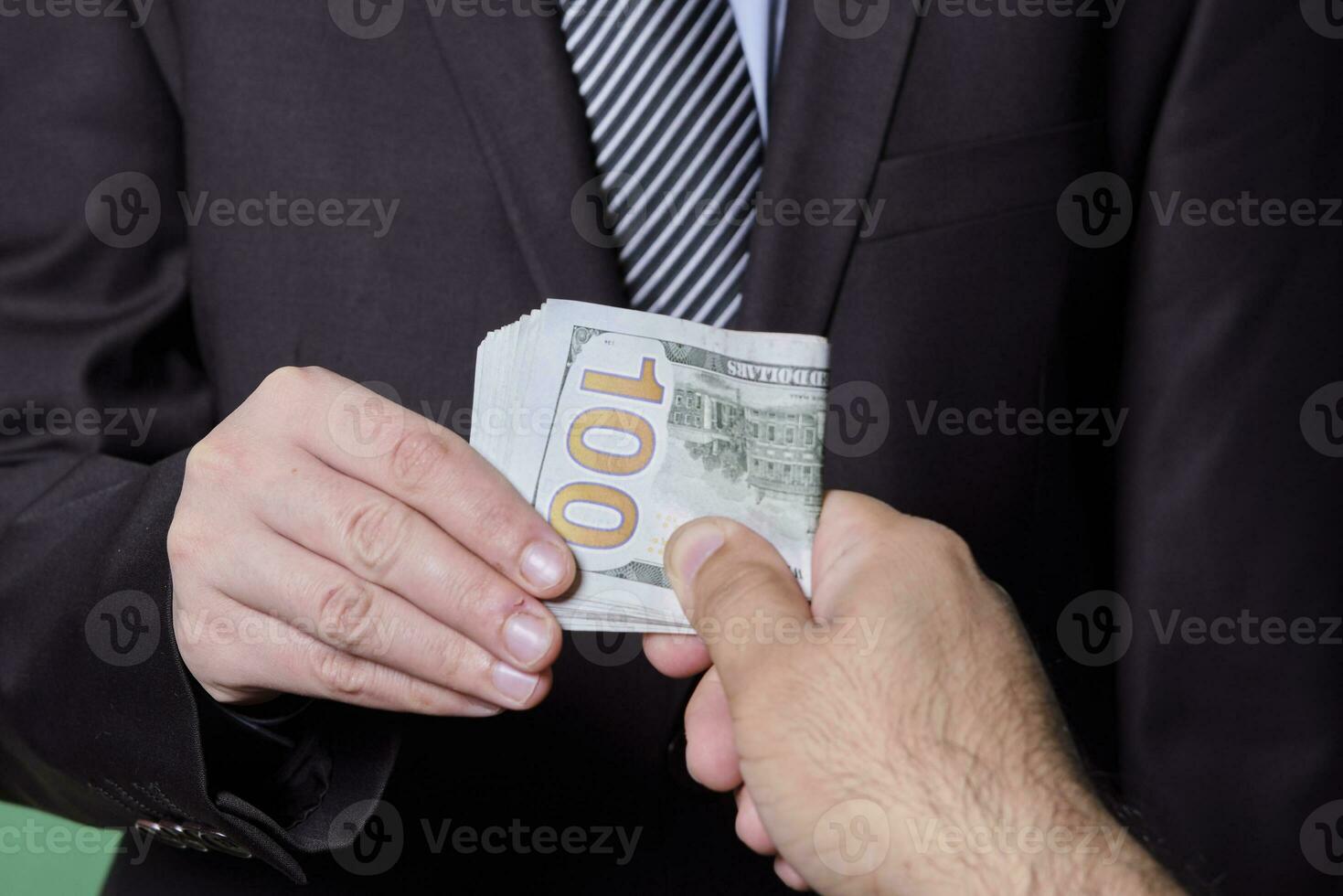 Giving money to a person. Giving bribe photo