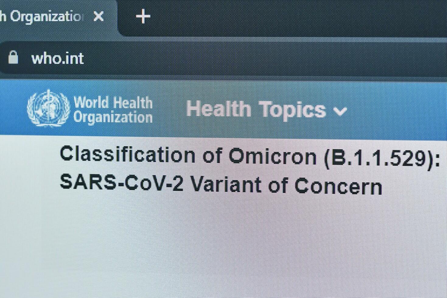 Tashkent, Uzbekistan - 27 November, 2021 WHO published first announcement about COVID-19 new variant called Omicron photo