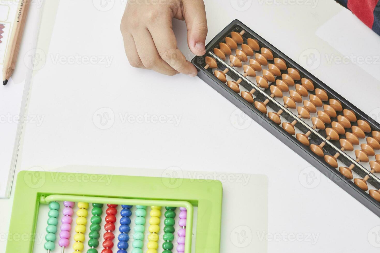 A schoolboy do mental math photo