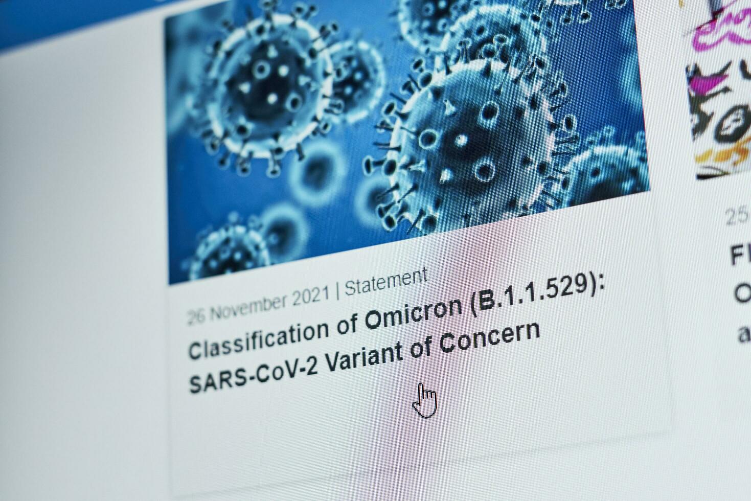 Tashkent, Uzbekistan - 27 November, 2021 WHO published first announcement about COVID-19 new variant called Omicron photo