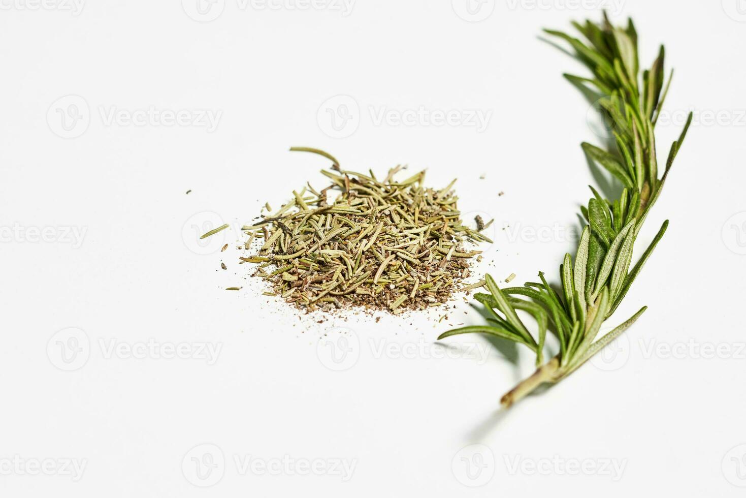 Fresh rosemary on white photo