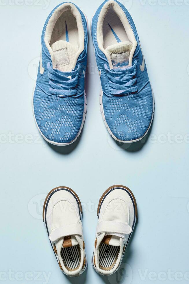 Two pairs of sneakers photo