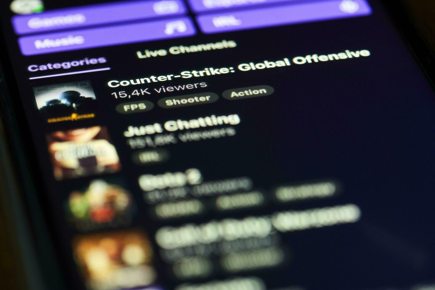 Twitch app on mobile phone screen photo