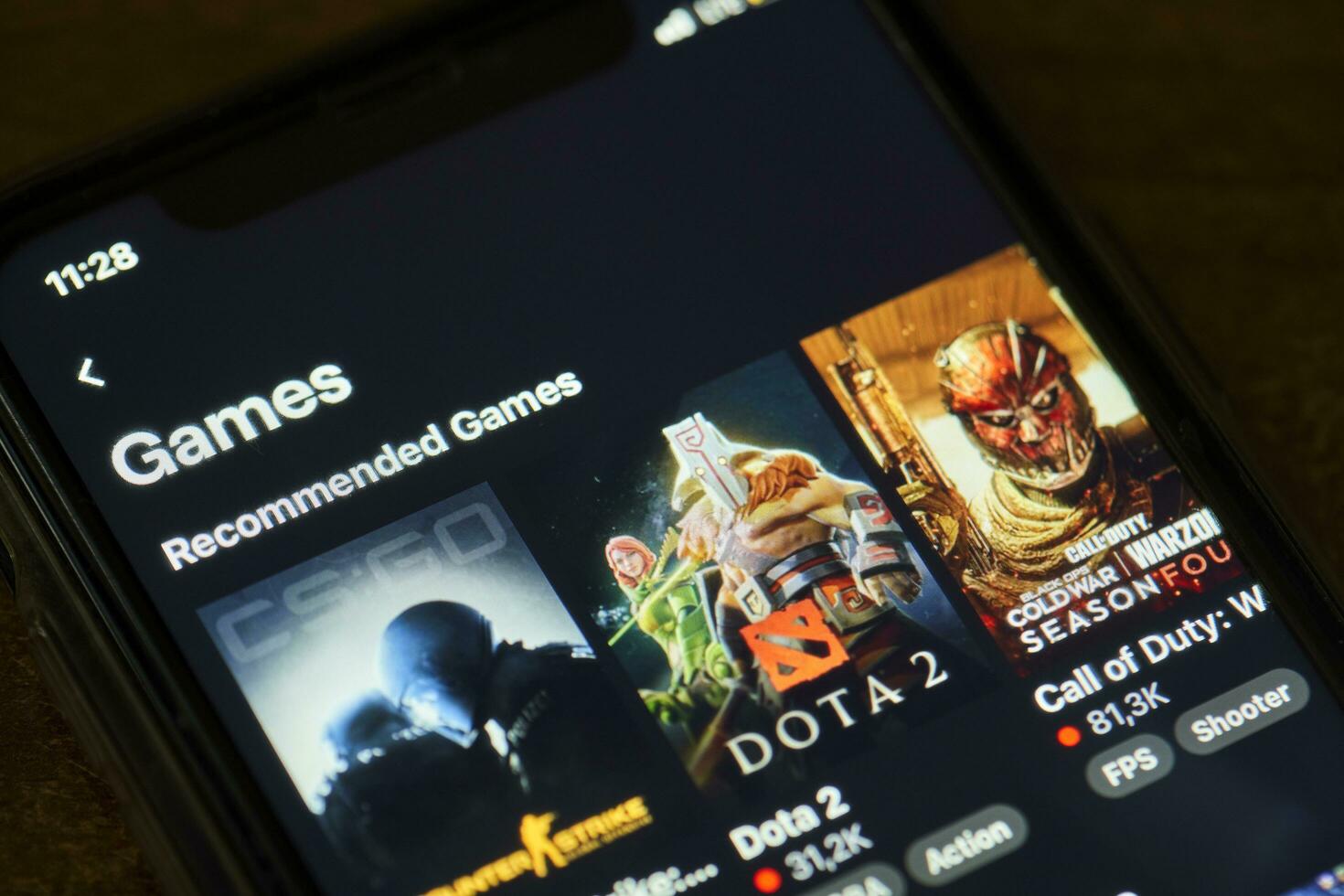 Twitch app on mobile phone screen photo
