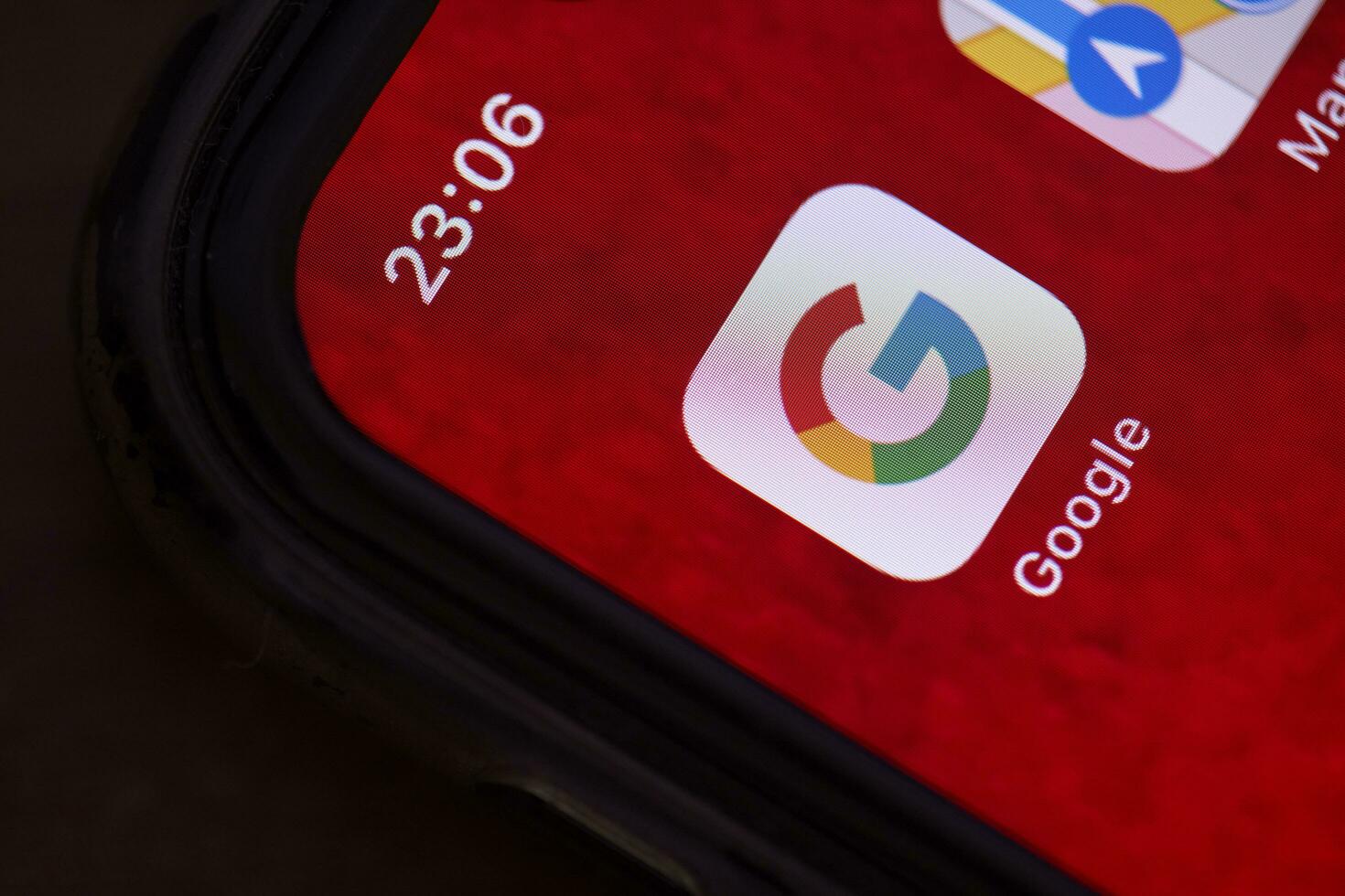 Google mobile application on smartphone screen photo