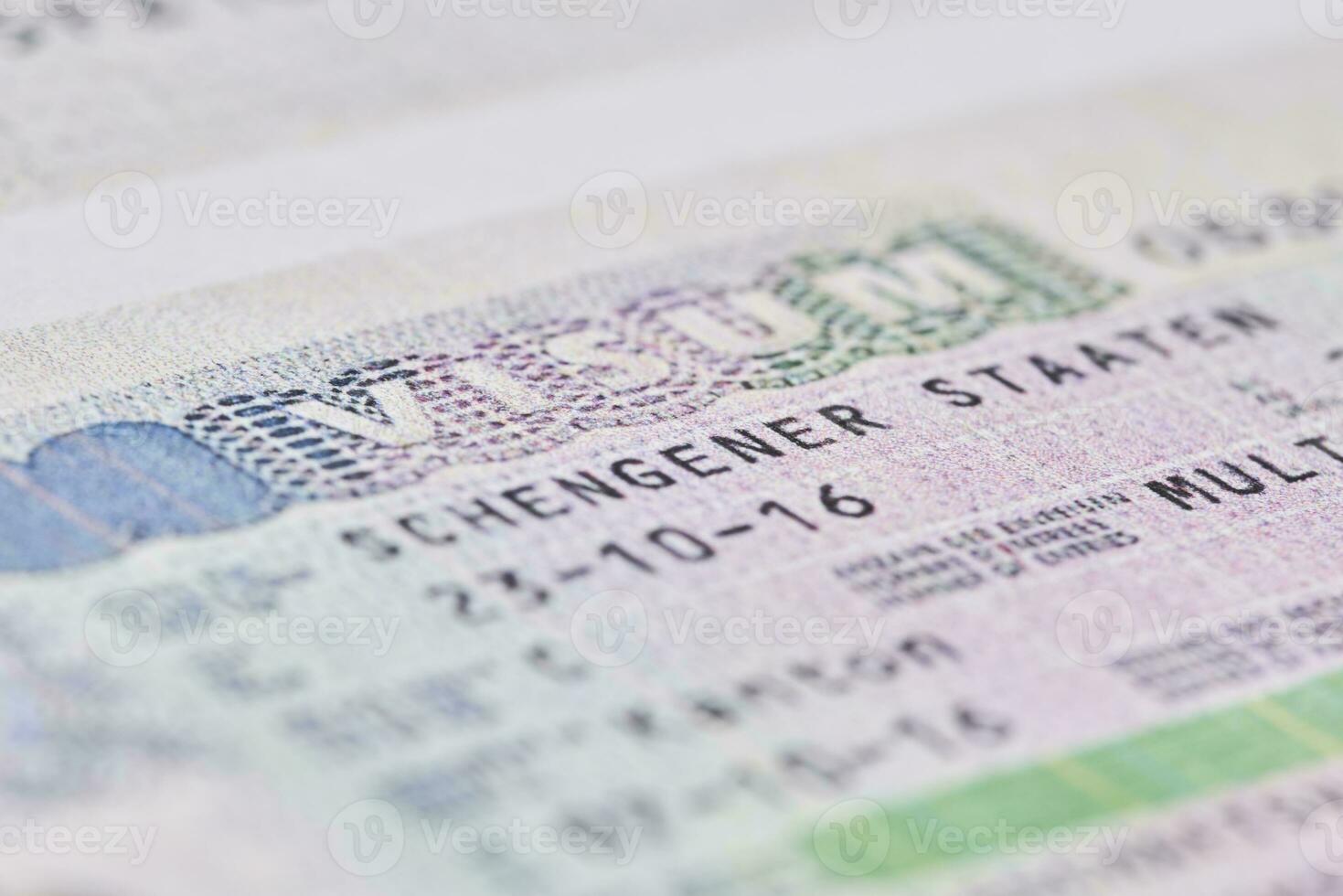 Schengen visa in passport. Close-up photo