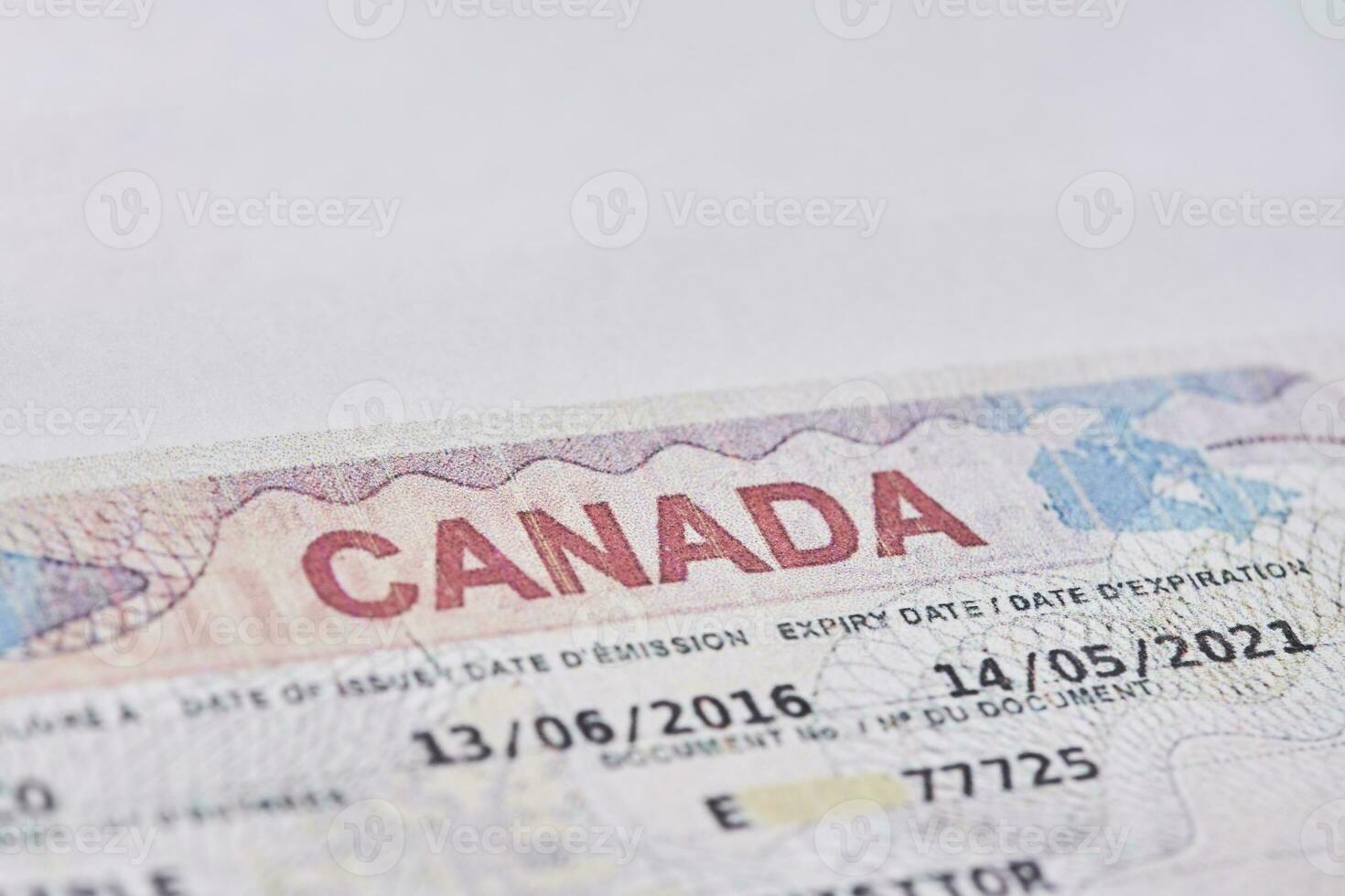 Canadian visa in passport. Close-up view photo