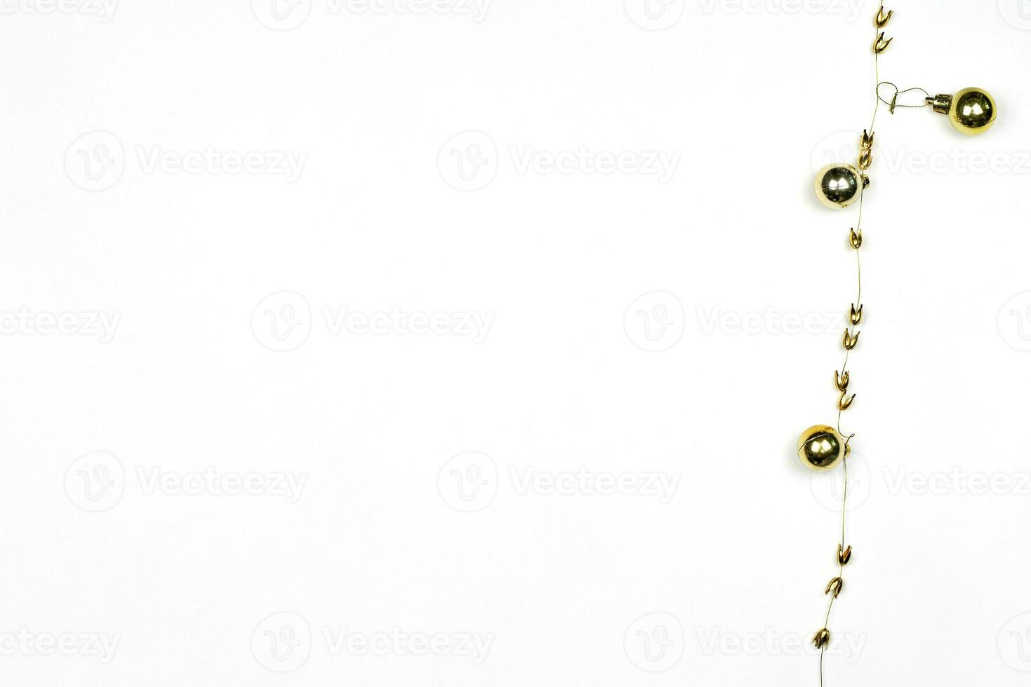 Golden Christmas decorations on white photo