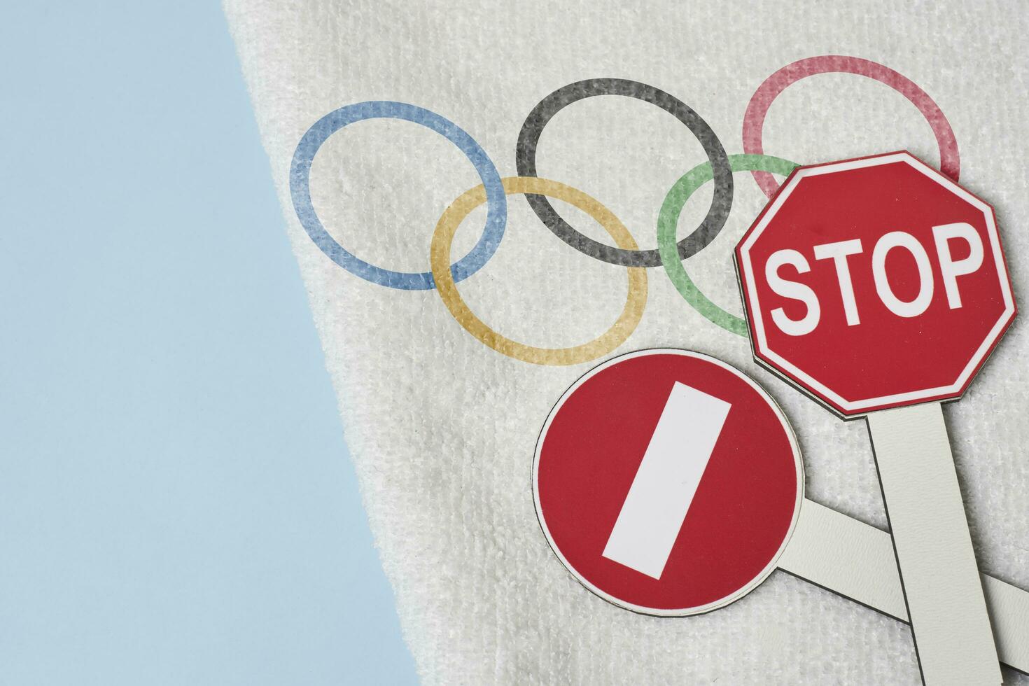 Boycotting Olympic Games Restricting traffic sings and Olympic flag on towel 31175937 Stock