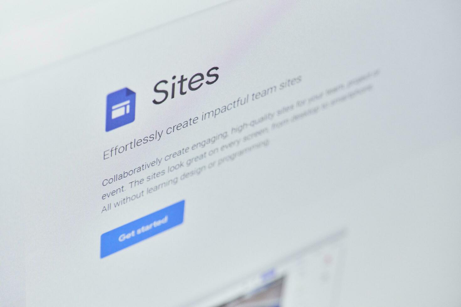 Google sites official web page on computer monitor photo