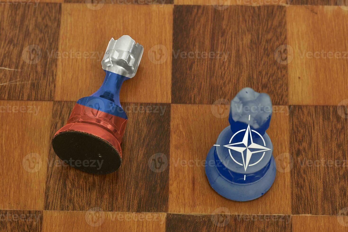 Two chess figures - showing confrontation between Russia and NATO photo