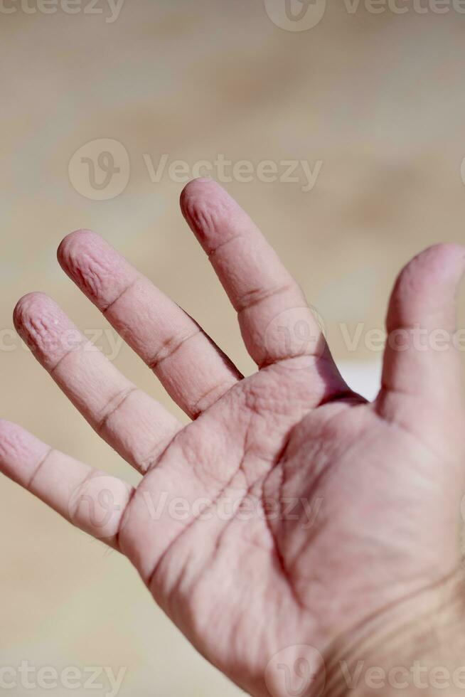 Hands got wrinkly and pruney in the bath, or in water photo