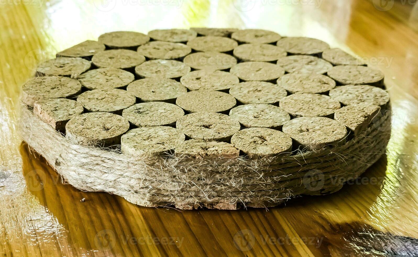 A stand for hot objects made from wine corks. Kitchen items. photo