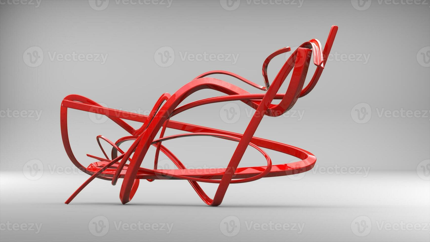 Red abstract swirls and ribbons - in a studio photo