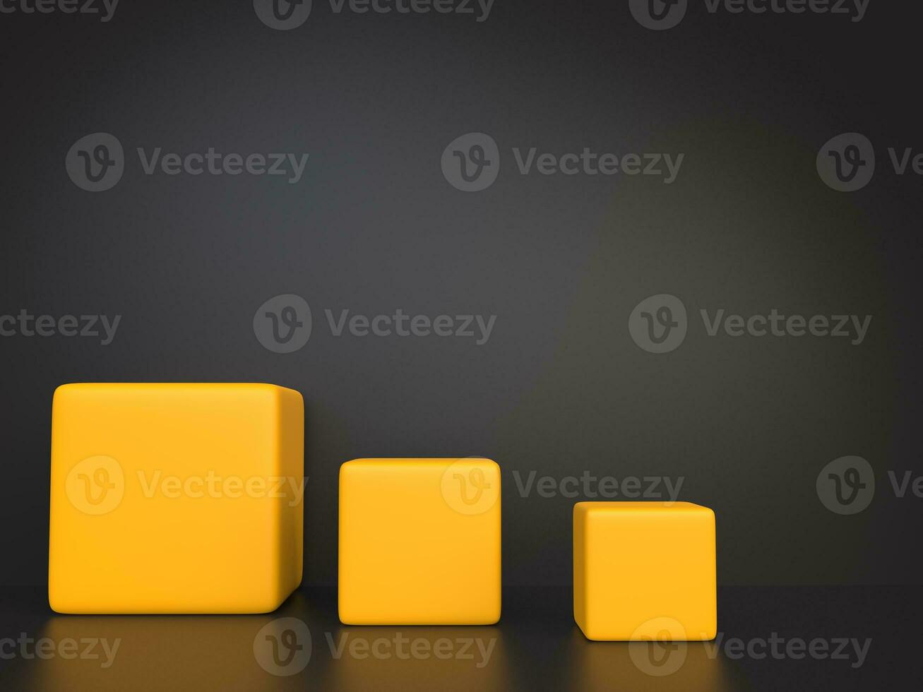 Three soft yellow cubes on dark background photo