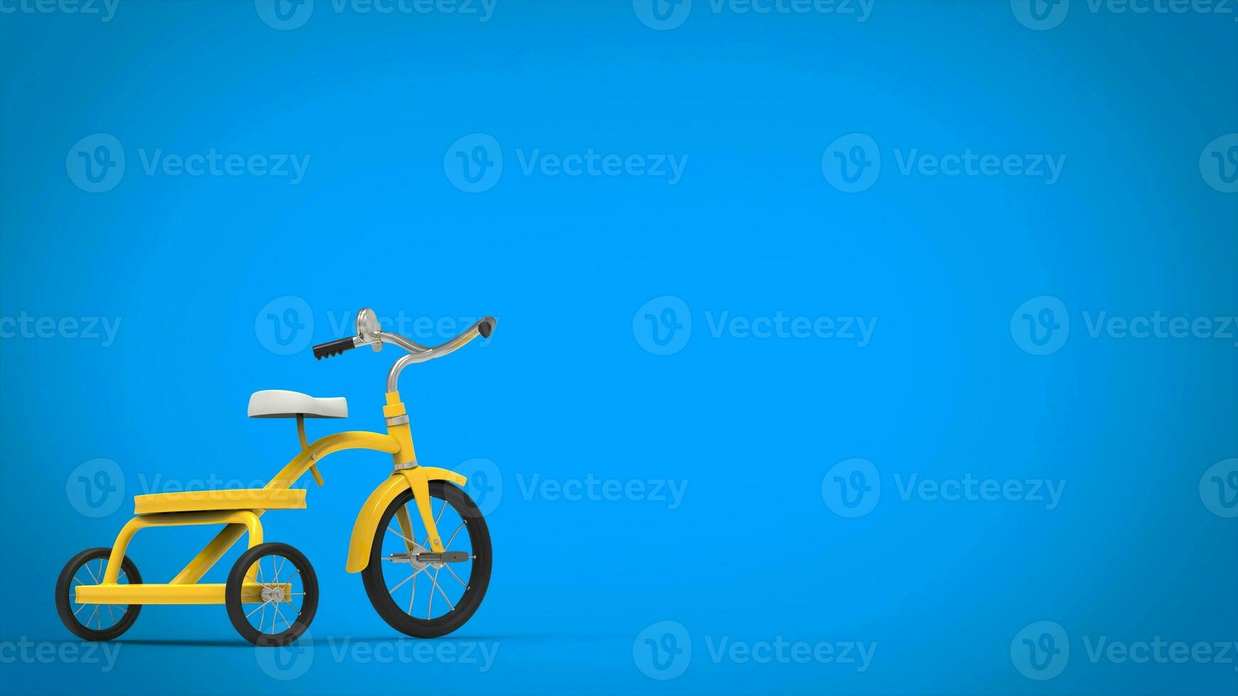 Pretty vintage yellow tricycle - blue background photo