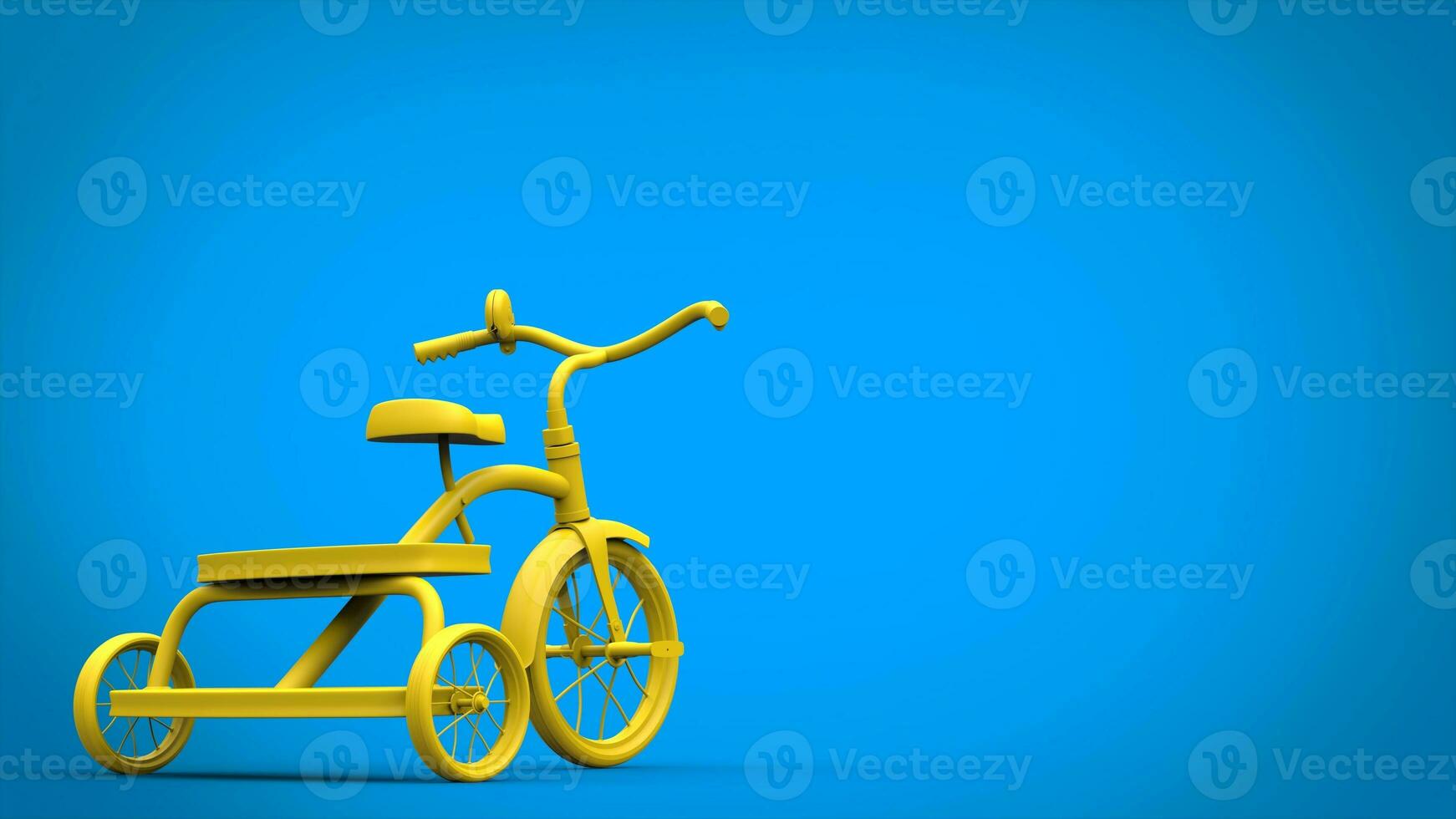 Bright yellow tricycle on blue background photo