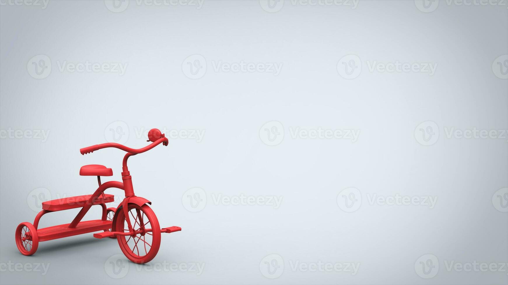 Beautiful red toy tricycle on bright background photo