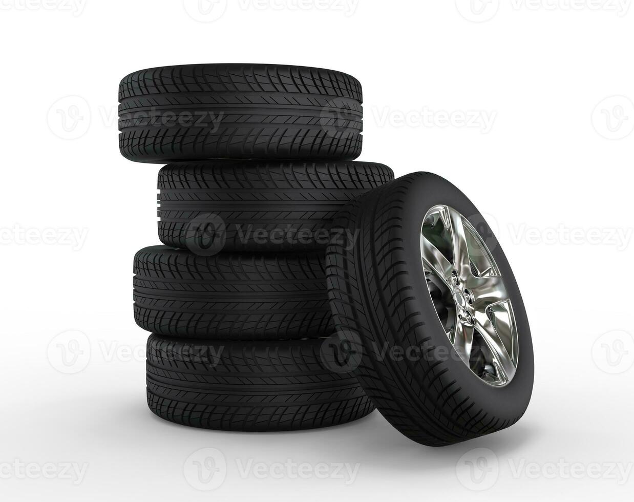 Stacked car wheels and tires photo