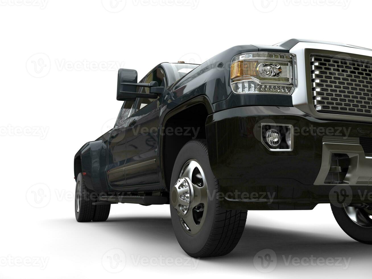 Dark gray pickup truck - low angle headlight closeup shot photo