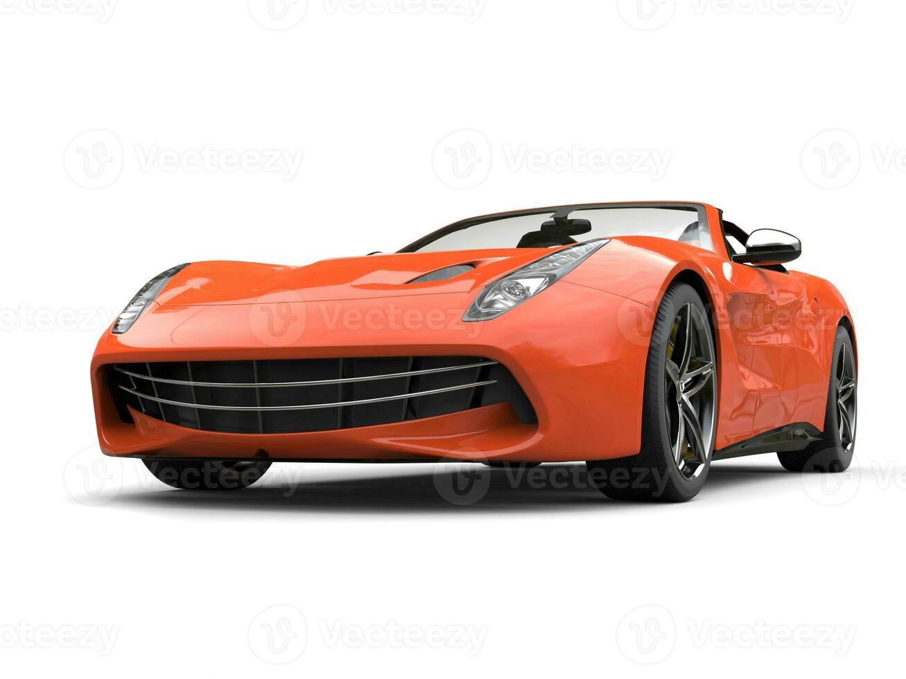 Warm orange modern convertible sports car - low angle front shot photo