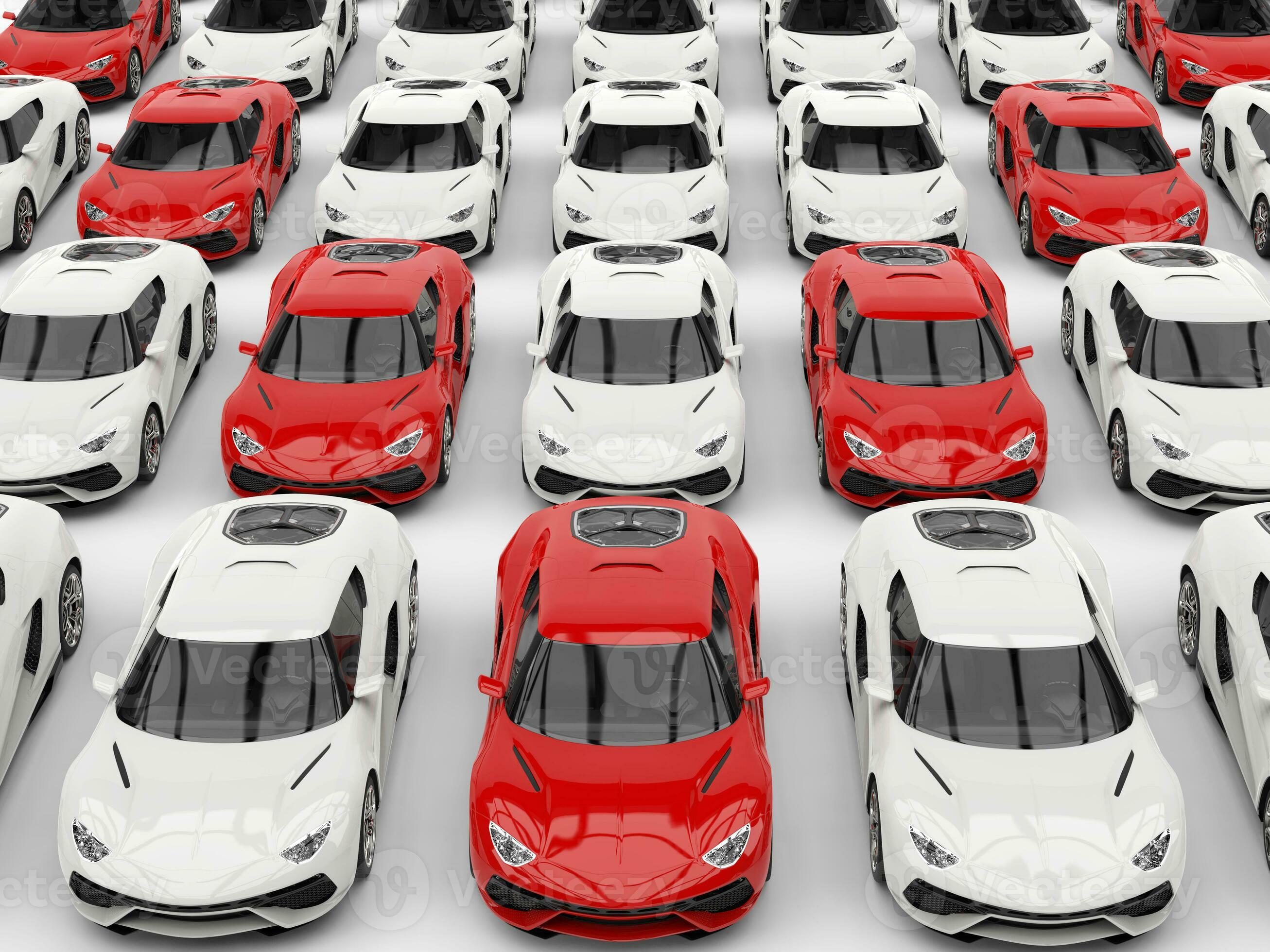 Red sports cars in formation amongst white cars 31195313 Stock Photo at