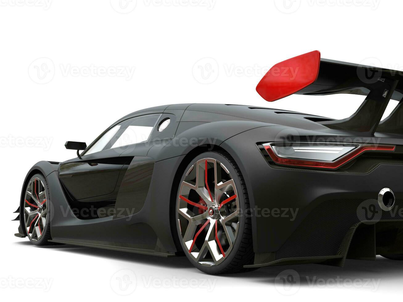 Gorgeous matte black super car with red details on the wheels and rear wing photo