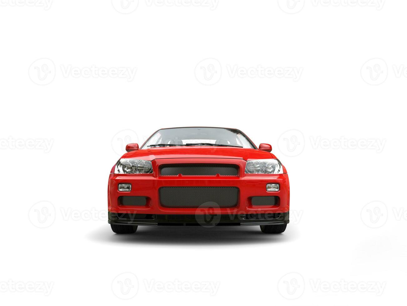 Modern scarlet red sporty urban city car - front view photo